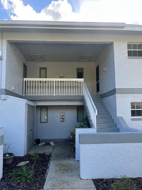 a view of entryway with a house