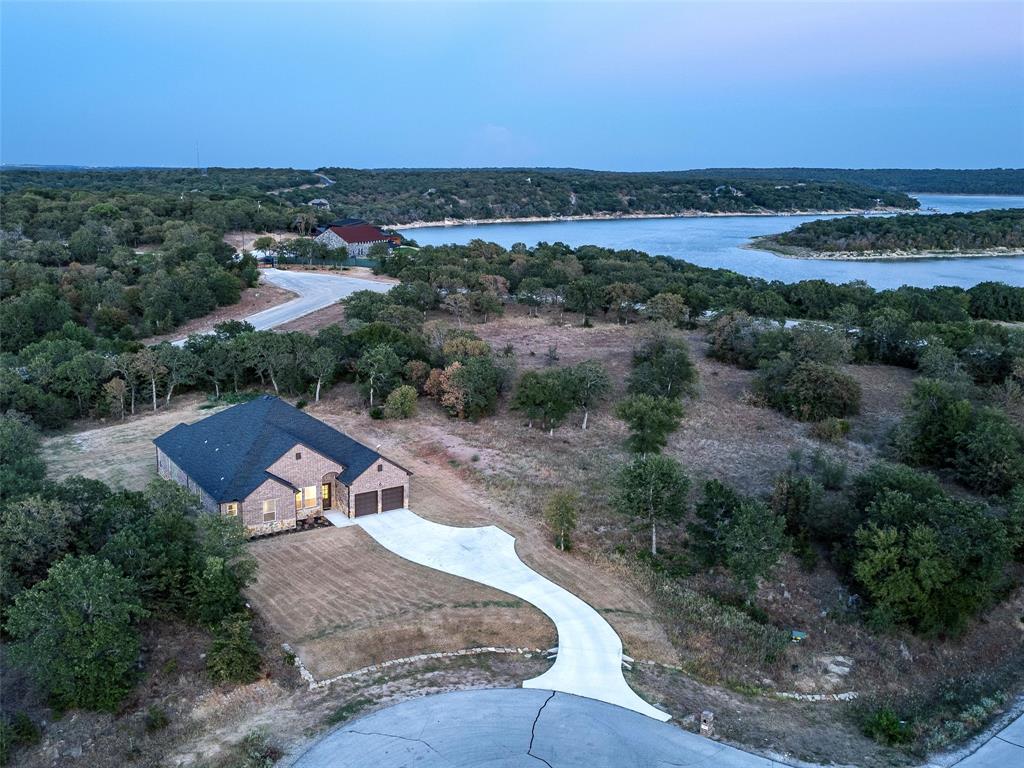 an aerial view of a house with a garden