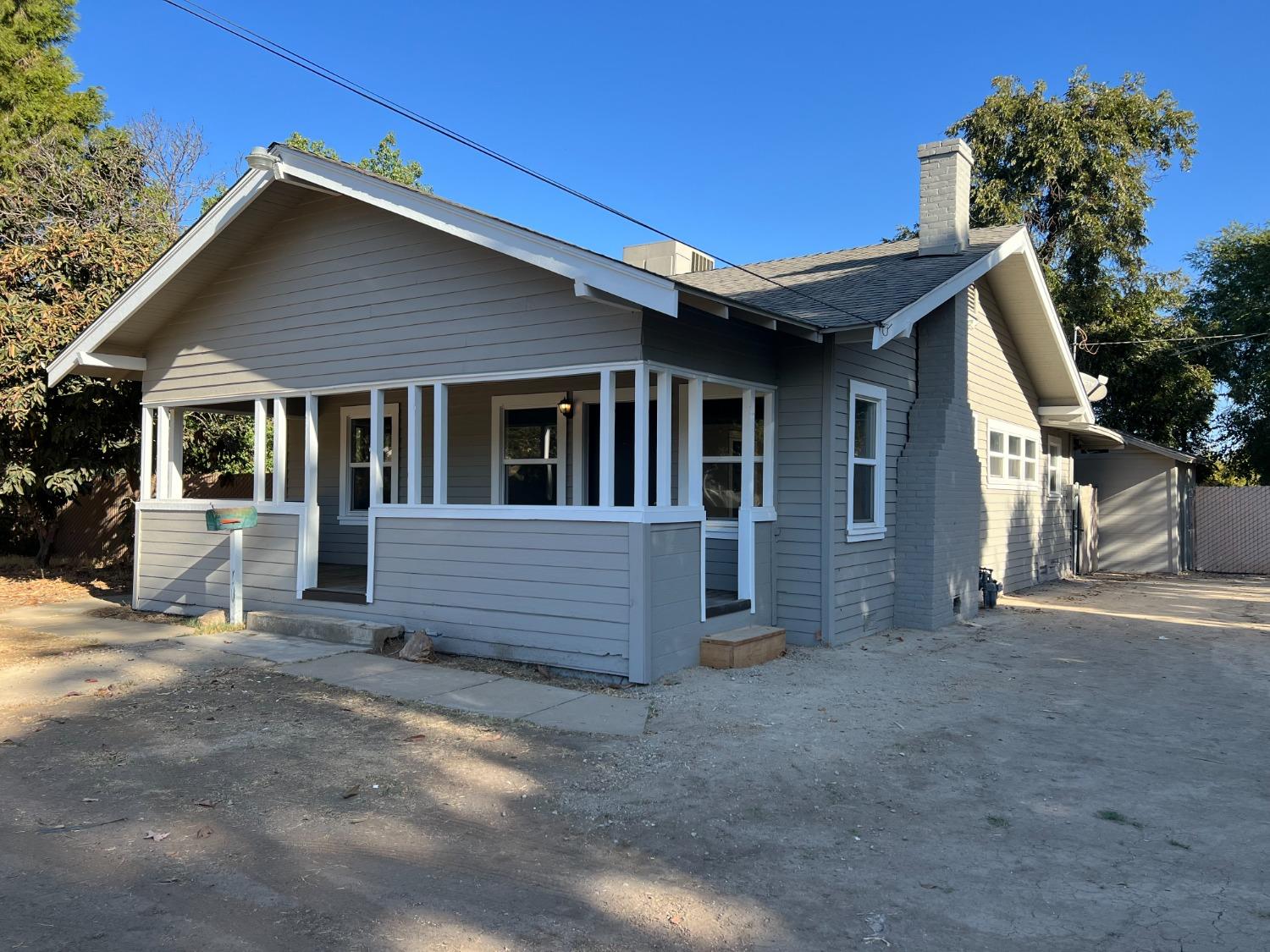 a front view of a house with a garage