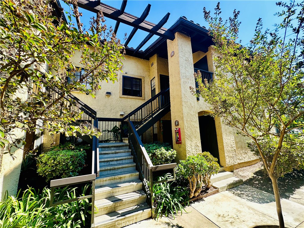 a house view with a outdoor space