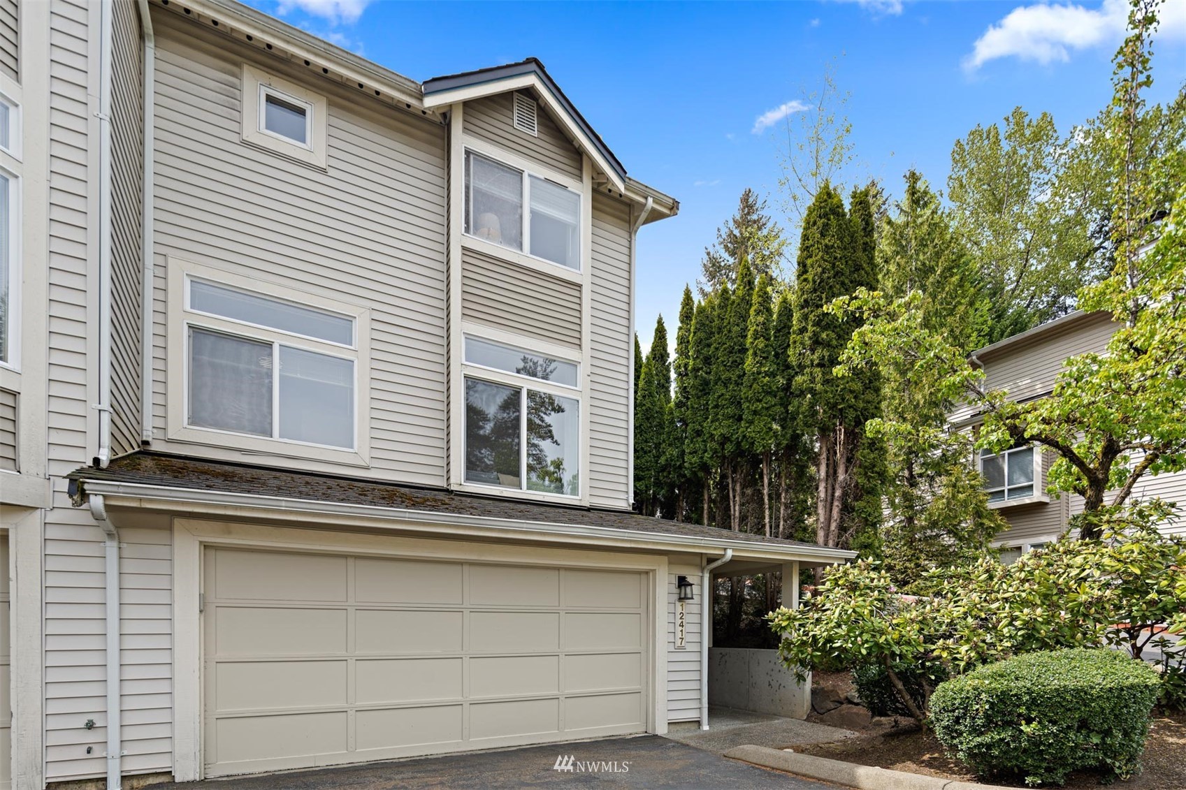 a view of a house with a garage