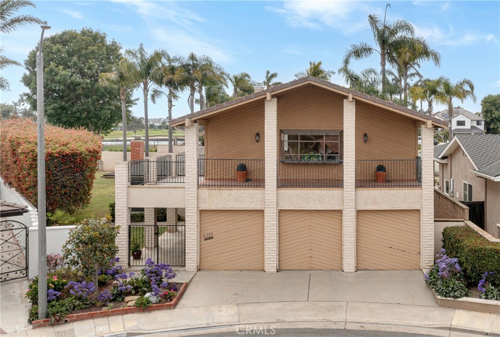 a view of a house with a garage