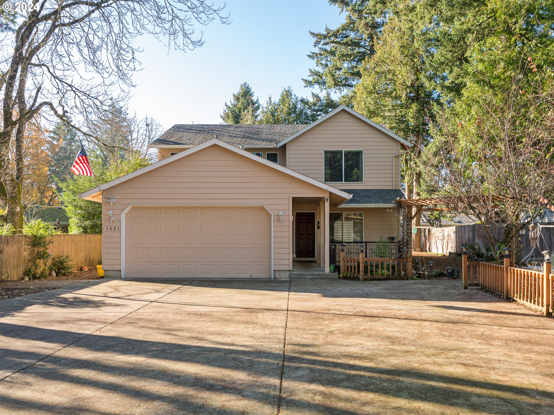 a view of a house and a yard