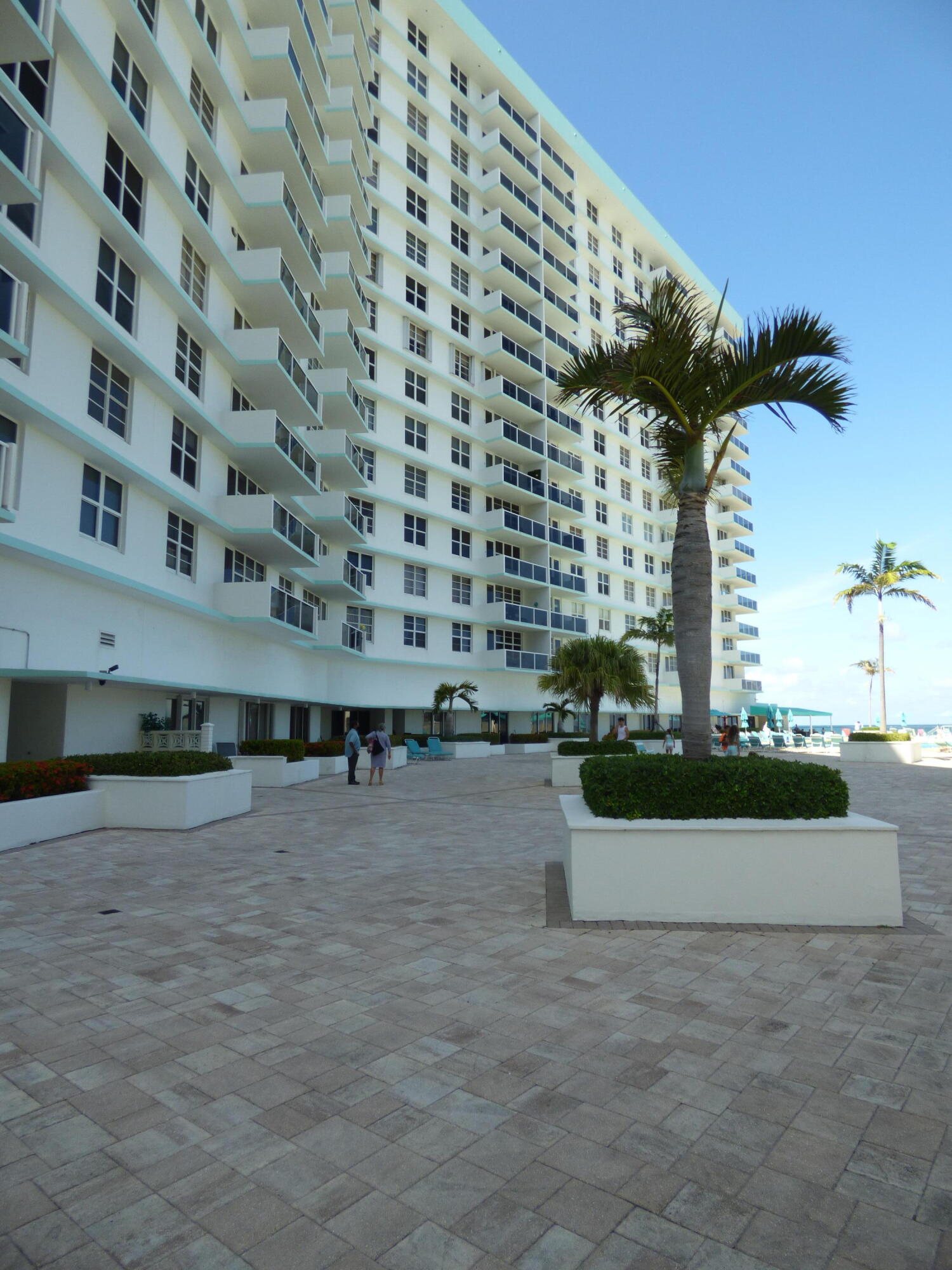 a view of pool with outdoor seating