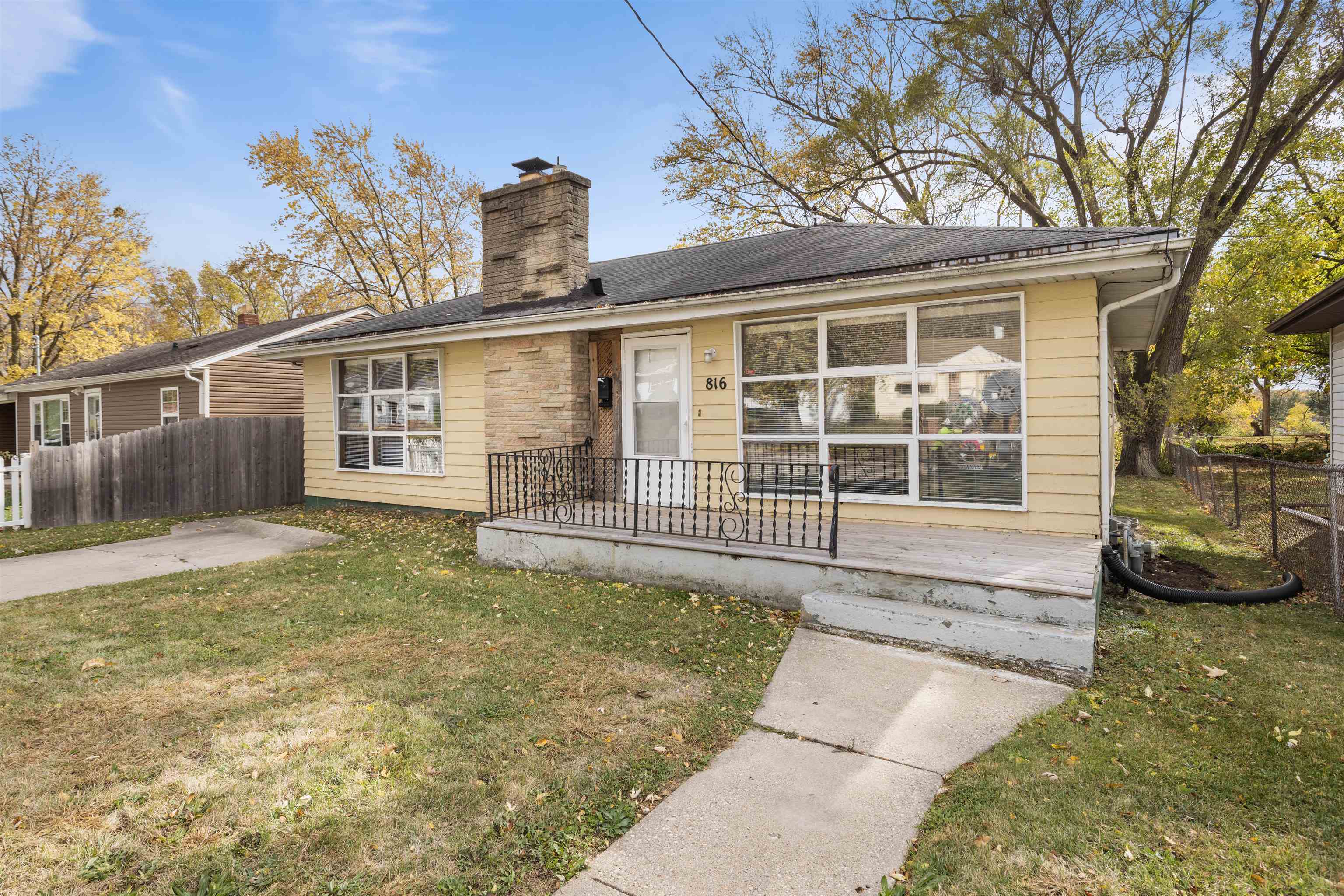 front view of a house with a yard