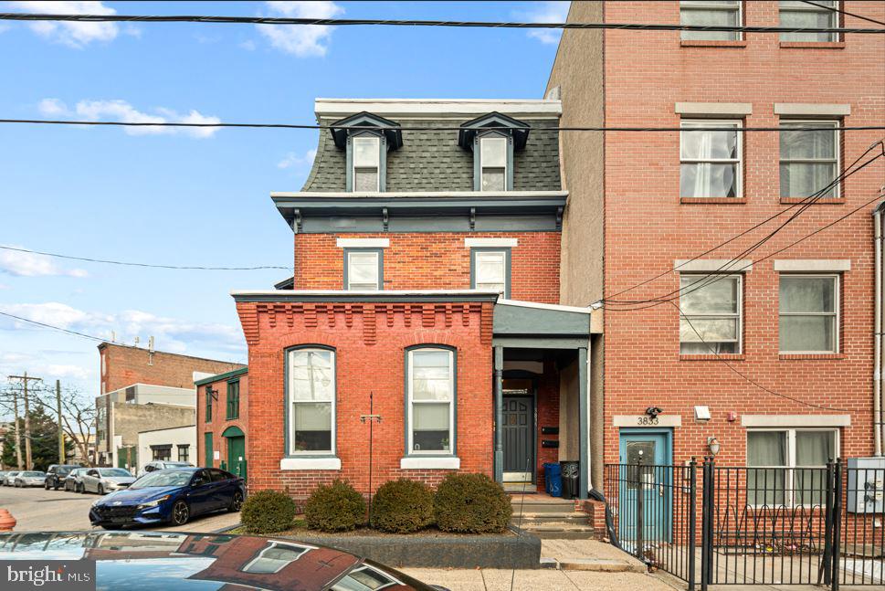 a front view of a multi story residential apartment building