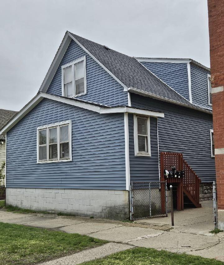 a front view of a house with garage