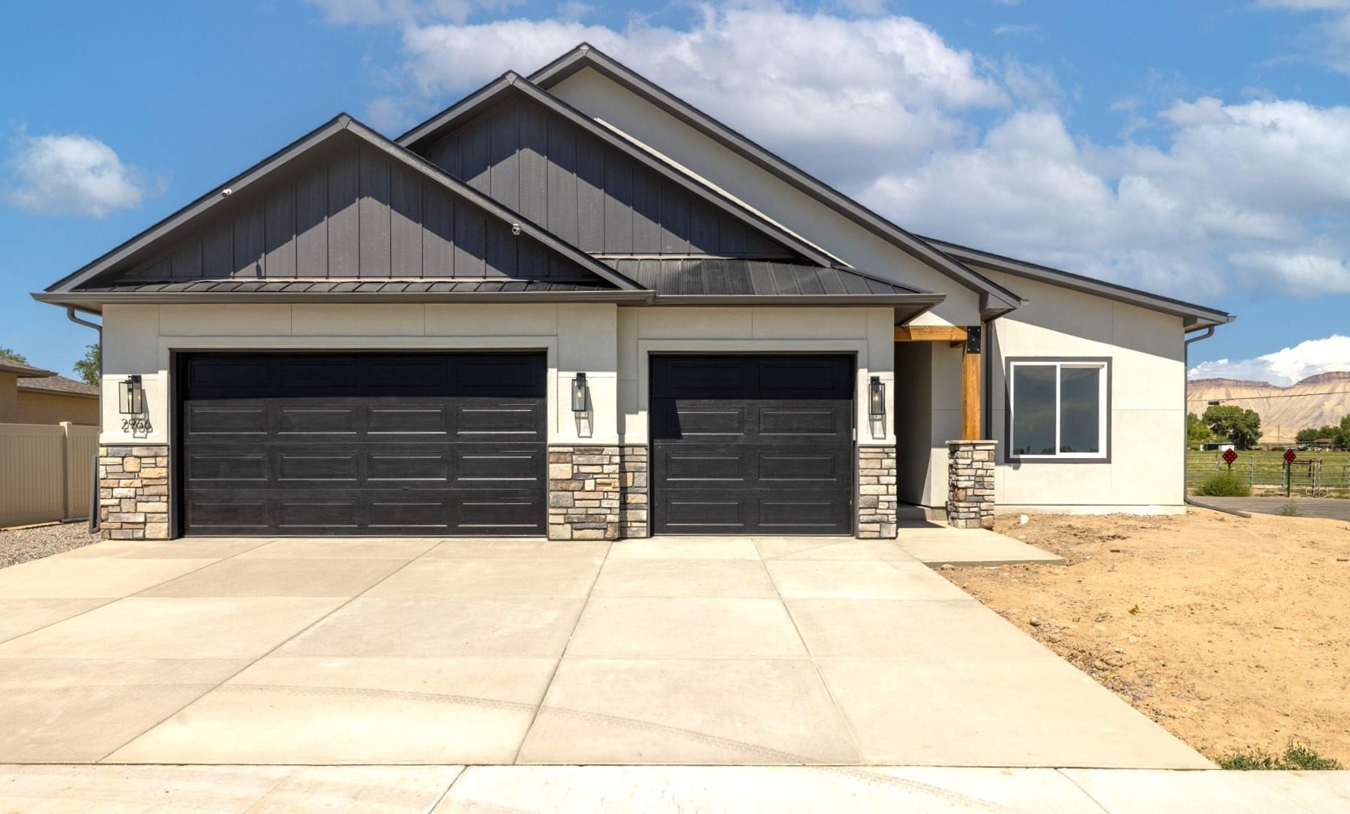 a front view of a house with a outdoor space