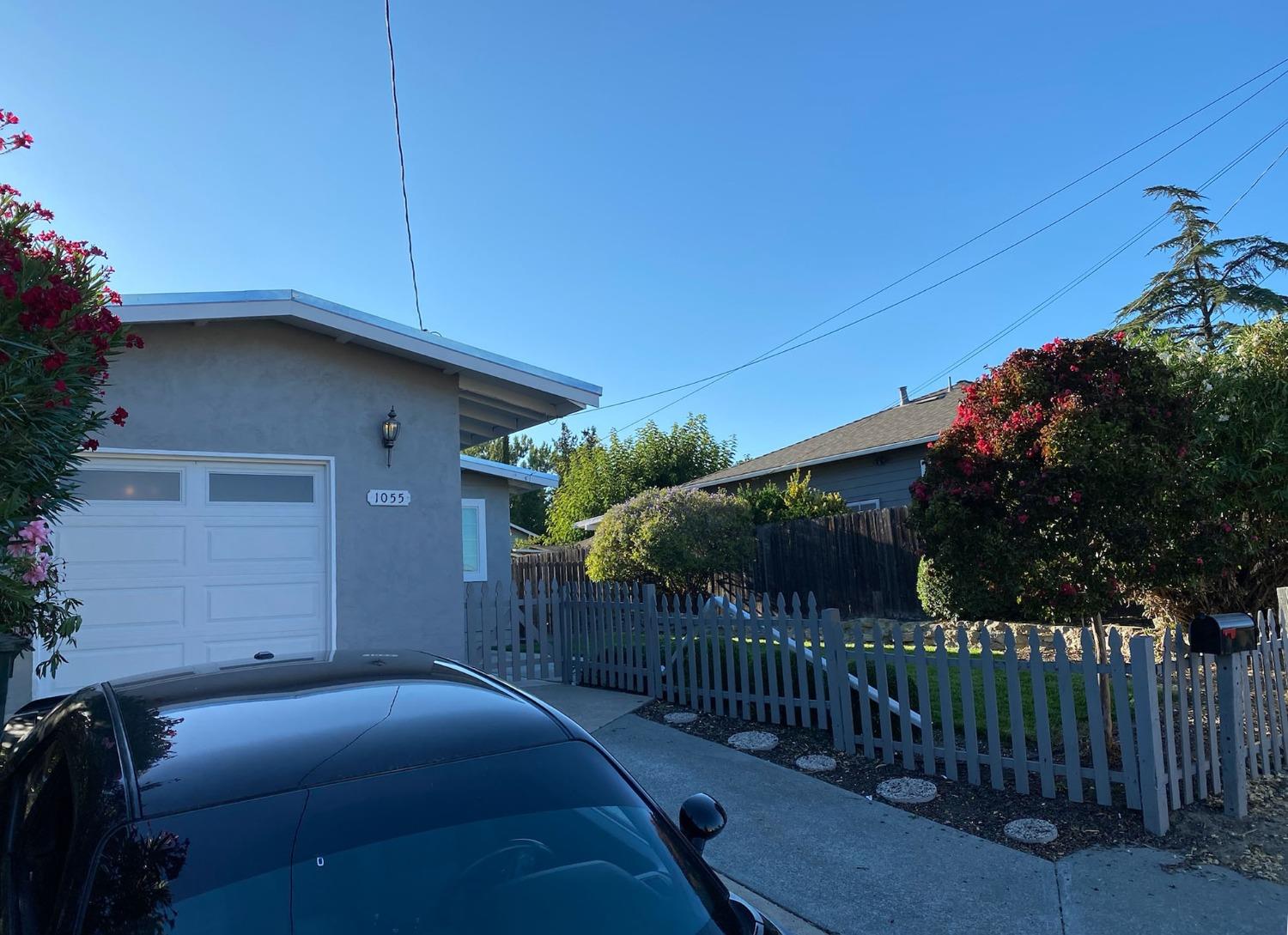 a street view along with deck and outdoor space