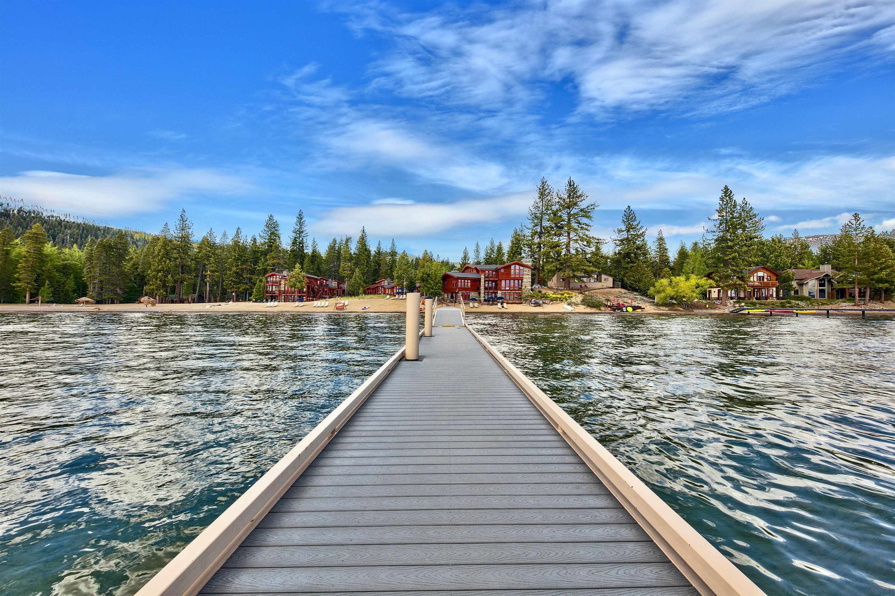 a view of a lake and trees