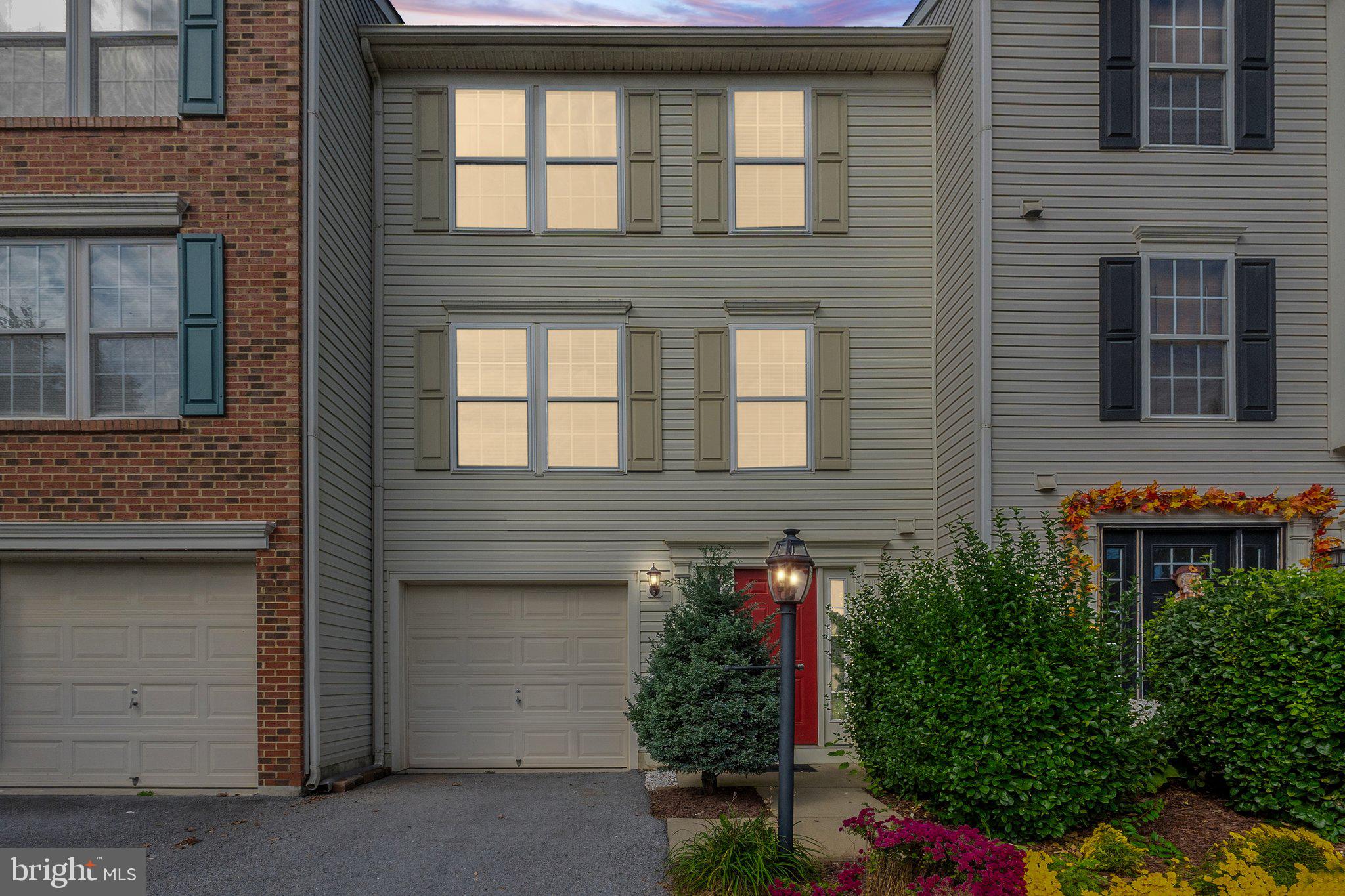 a front view of a house having yard