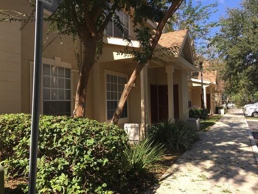 a front view of a house having yard