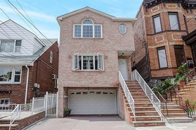 a front view of a house with a balcony