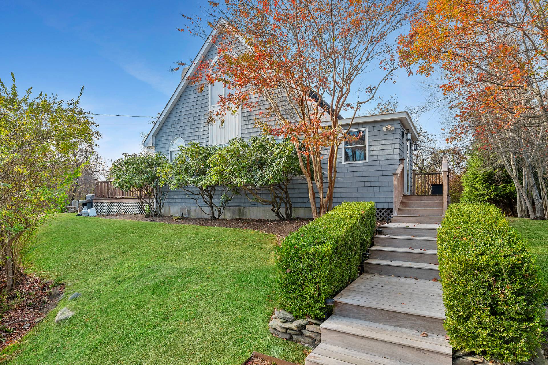 a view of a house with brick walls