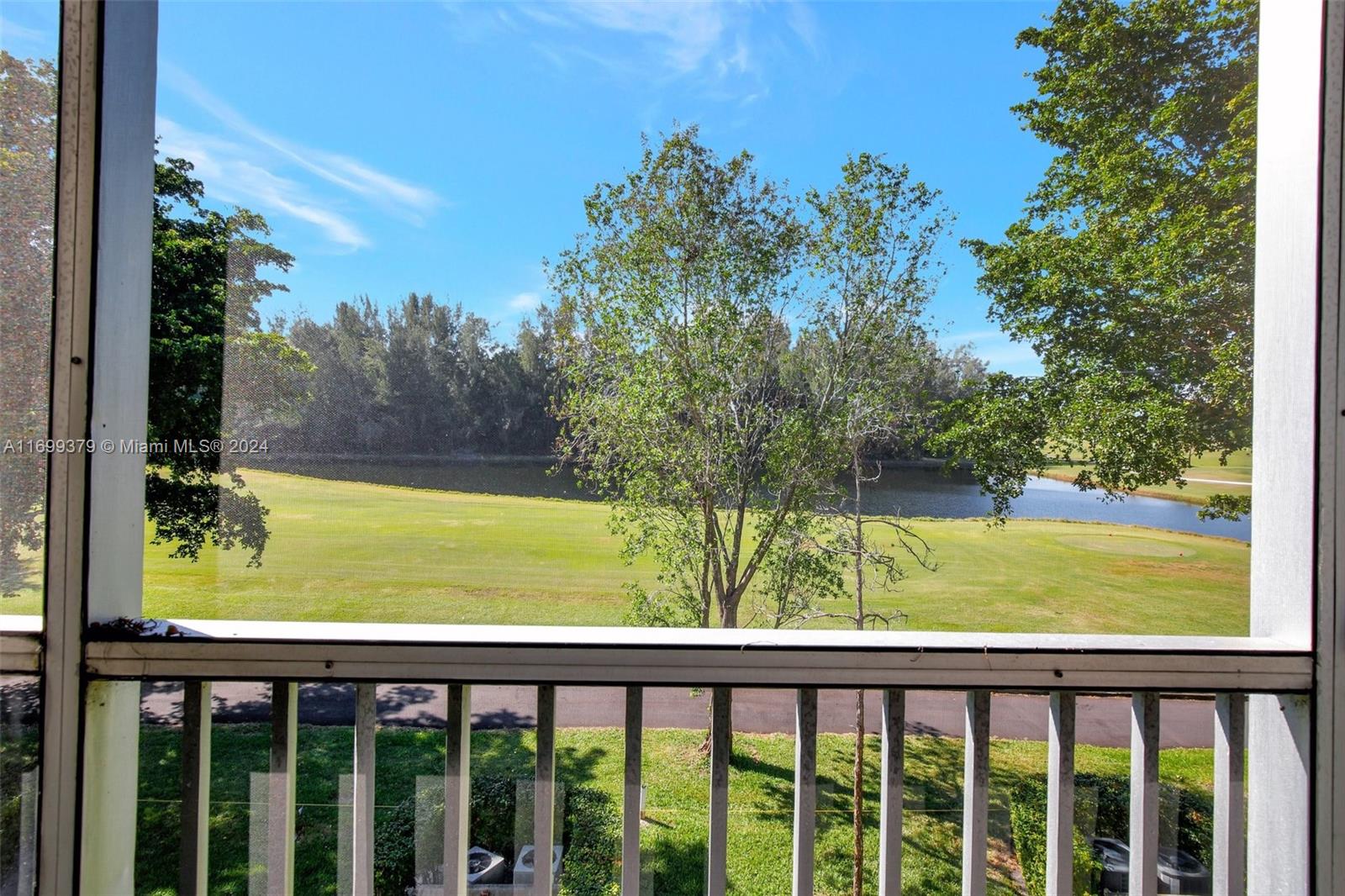 a view of a garden from a balcony