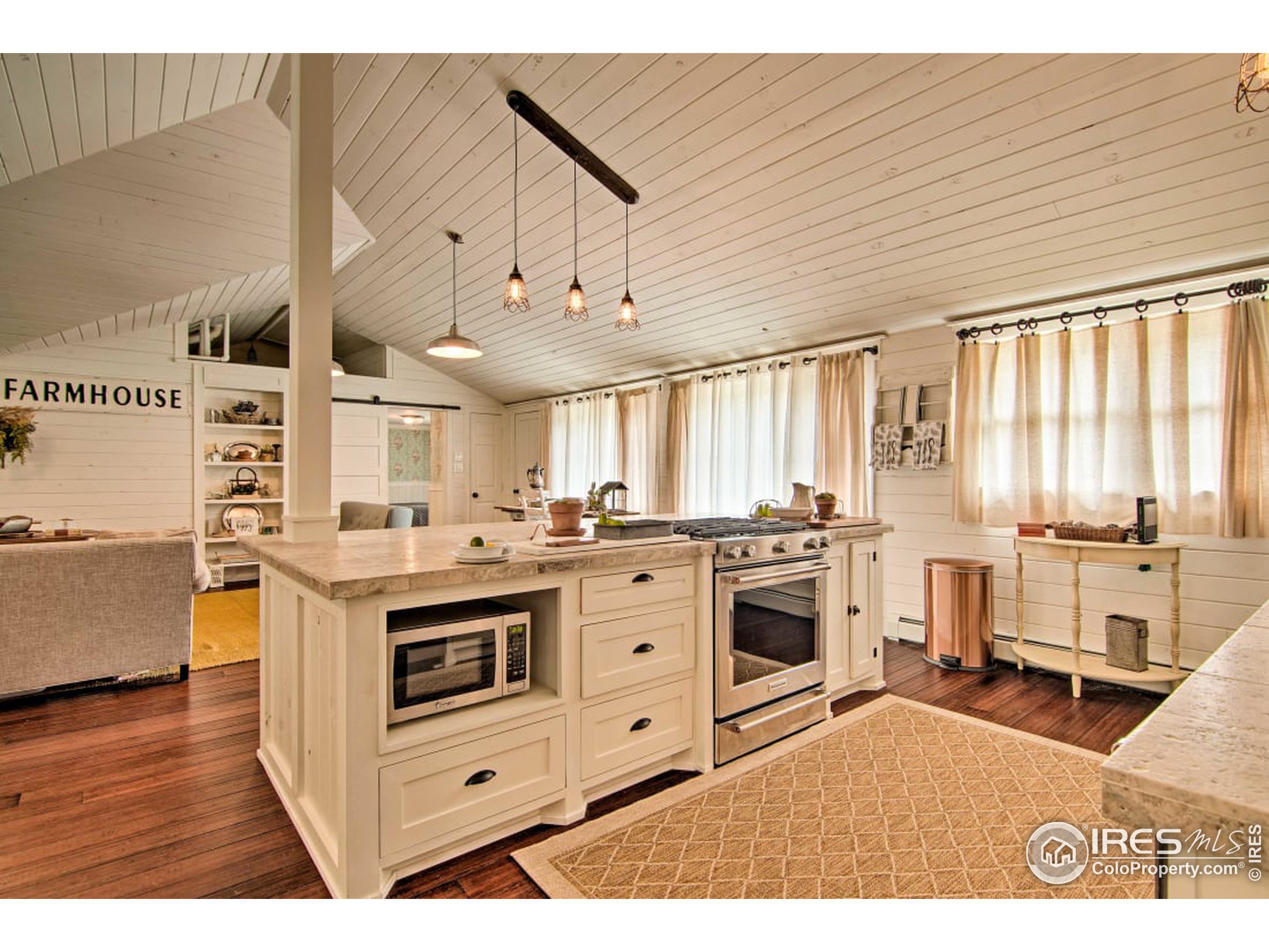 a kitchen with stainless steel appliances a stove top oven and sink