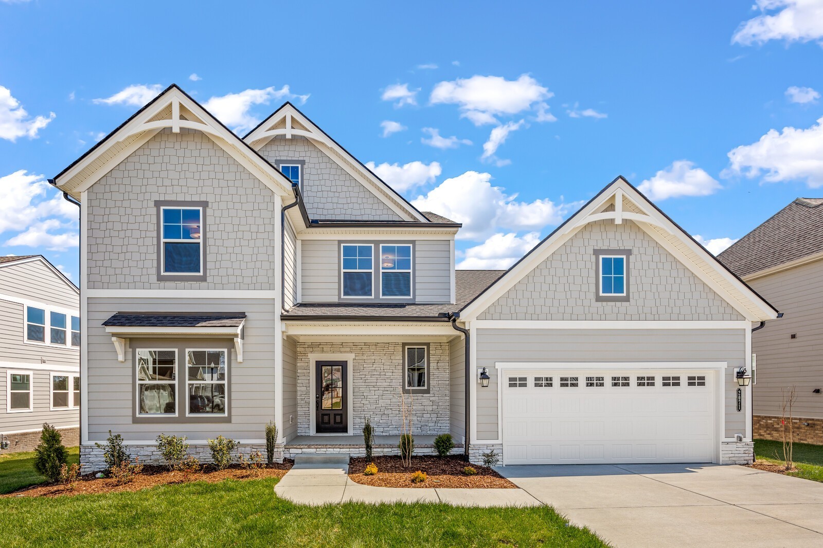 a front view of a house with yard