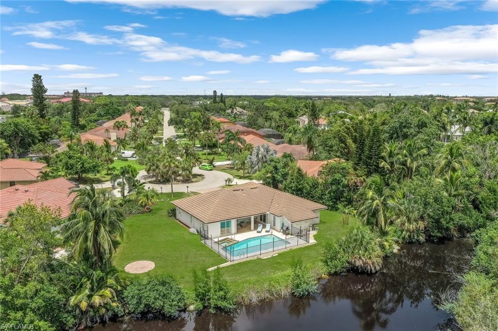 an aerial view of a house with a garden