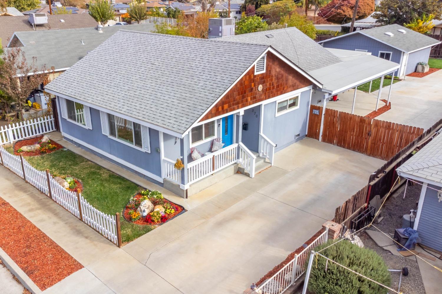 an aerial view of a house with swimming pool