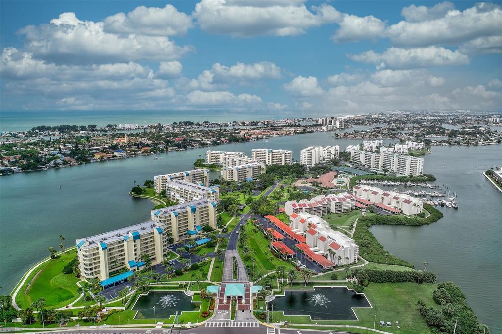 a view of a lake with a yard