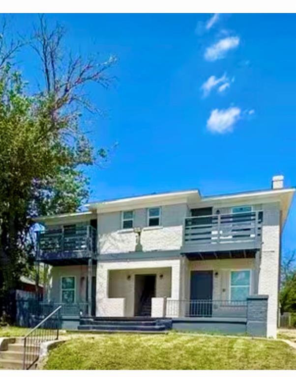 a view of house with swimming pool