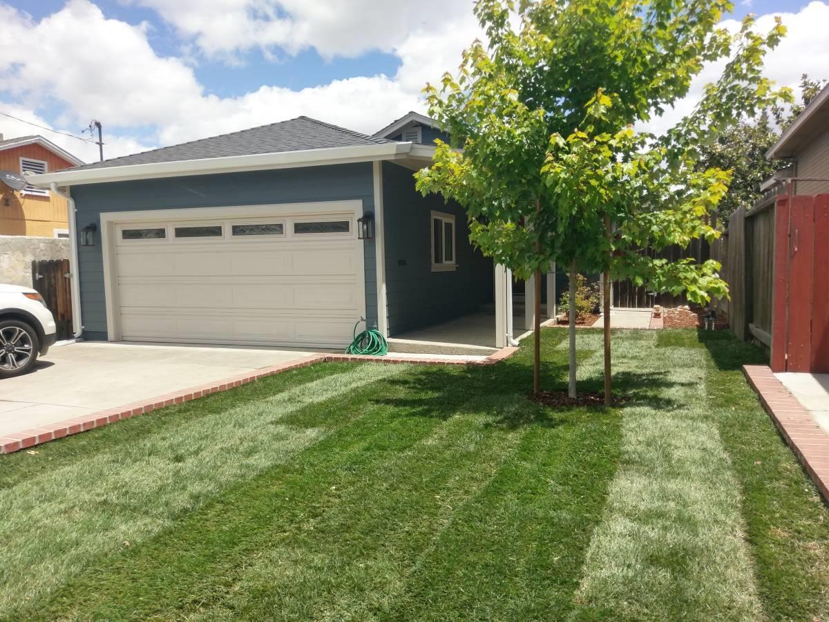 a house view with a garden space