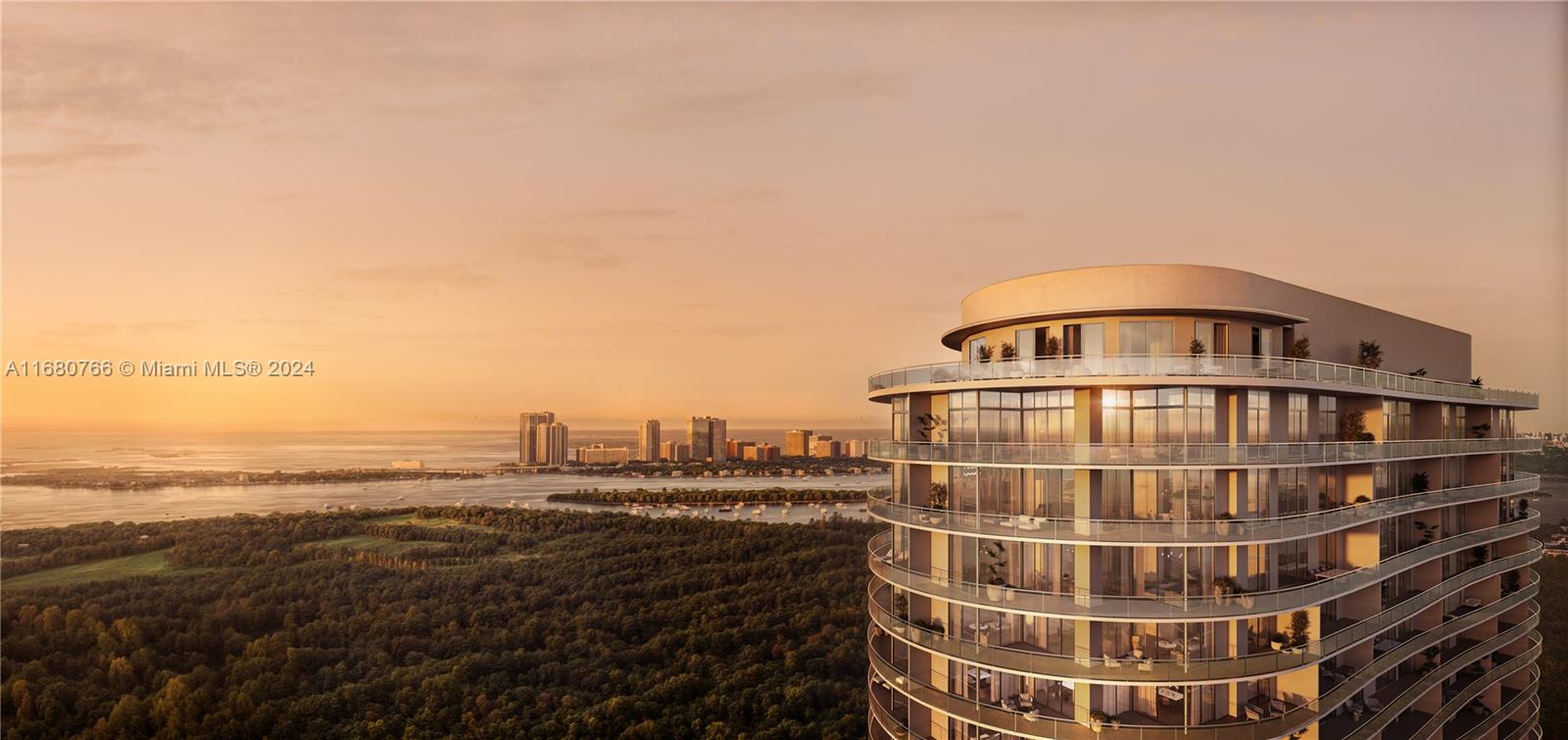 a view of a tall building next to a lake