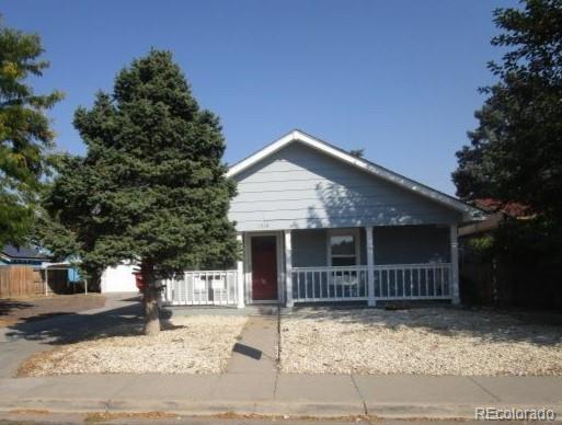 a front view of a house with garage