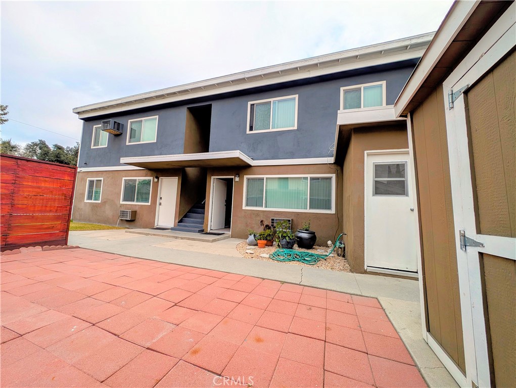 a front view of a house with patio