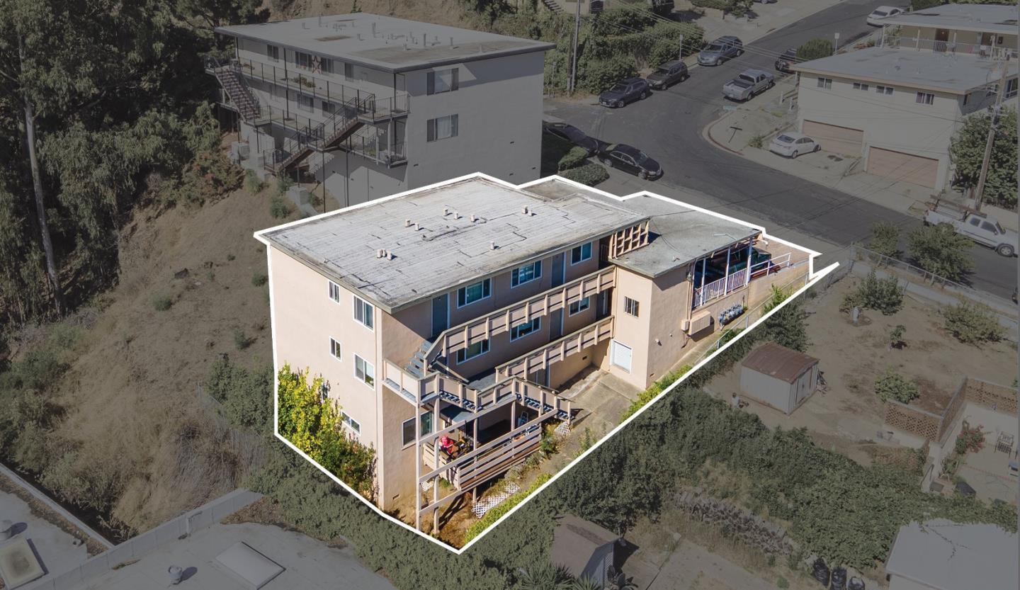 an aerial view of a house with balcony