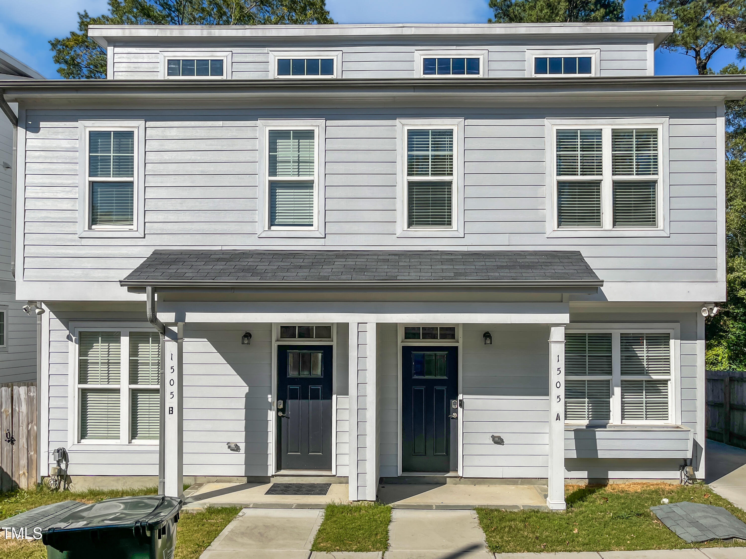 a front view of a house with a garage