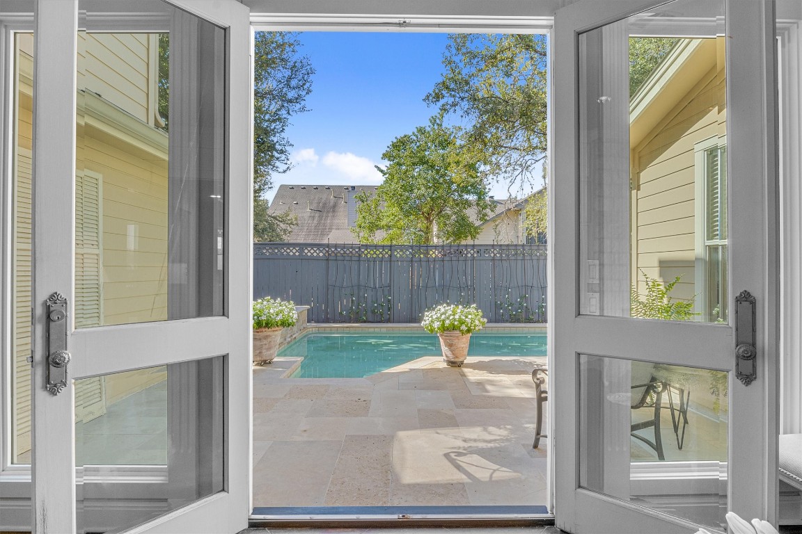 a view of backyard with small garden