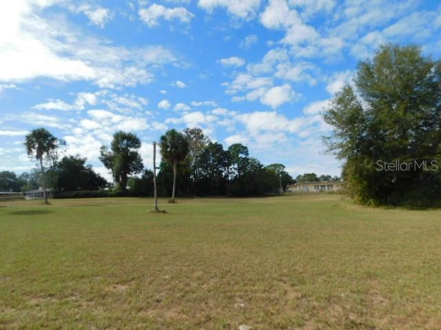 a view of outdoor space and yard