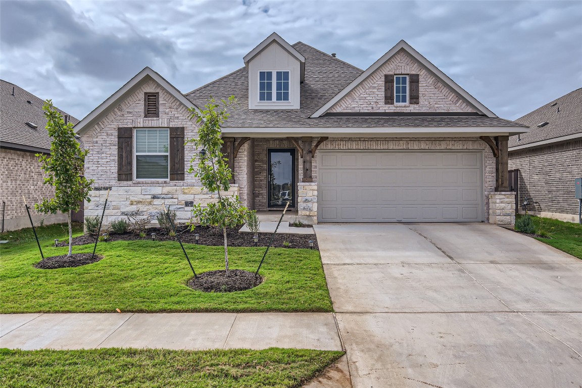 Welcome to 299 Grand Teton, a 2024 Ashton Woods home!