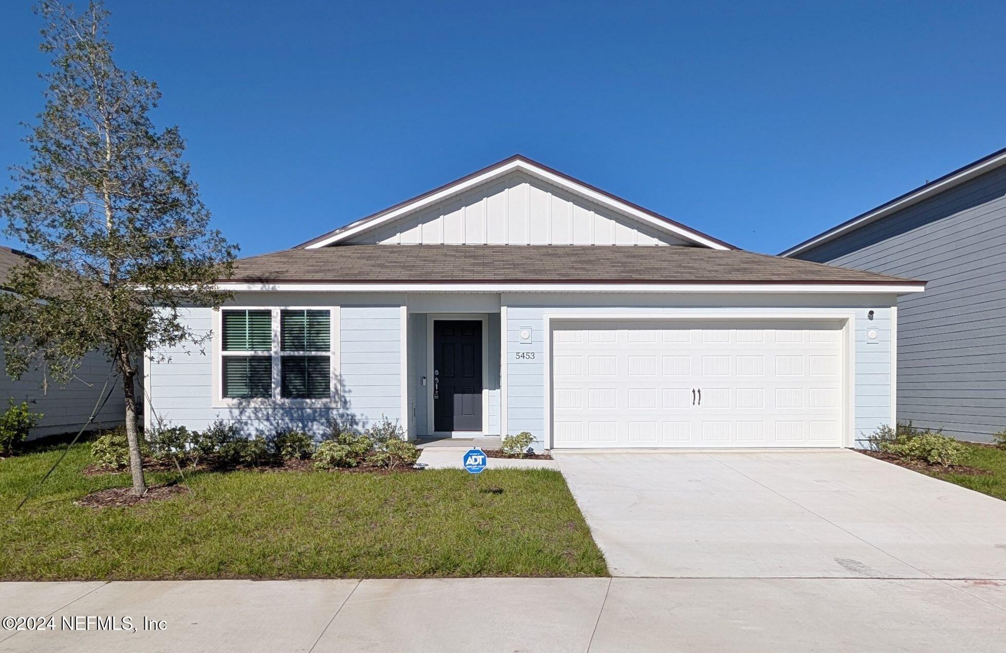 a front view of house with yard