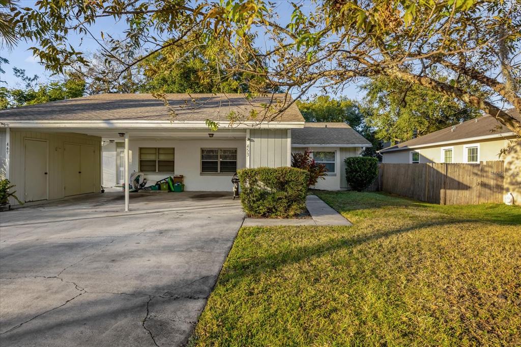 front view of house with a yard