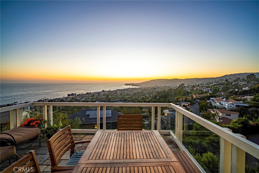 a view of balcony with furniture