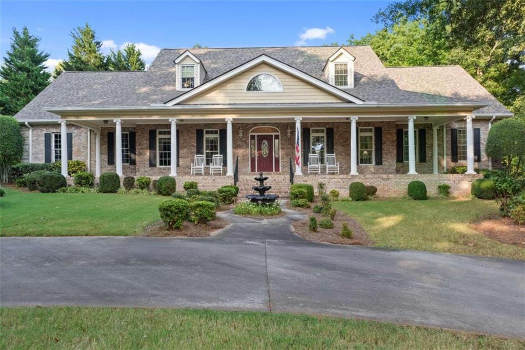 front view of a house with a yard