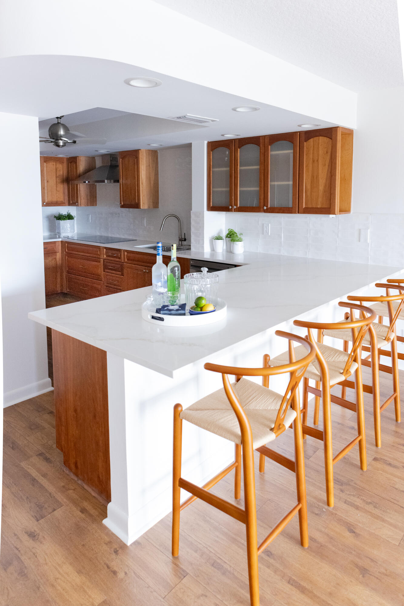 a kitchen with a table and chairs in it