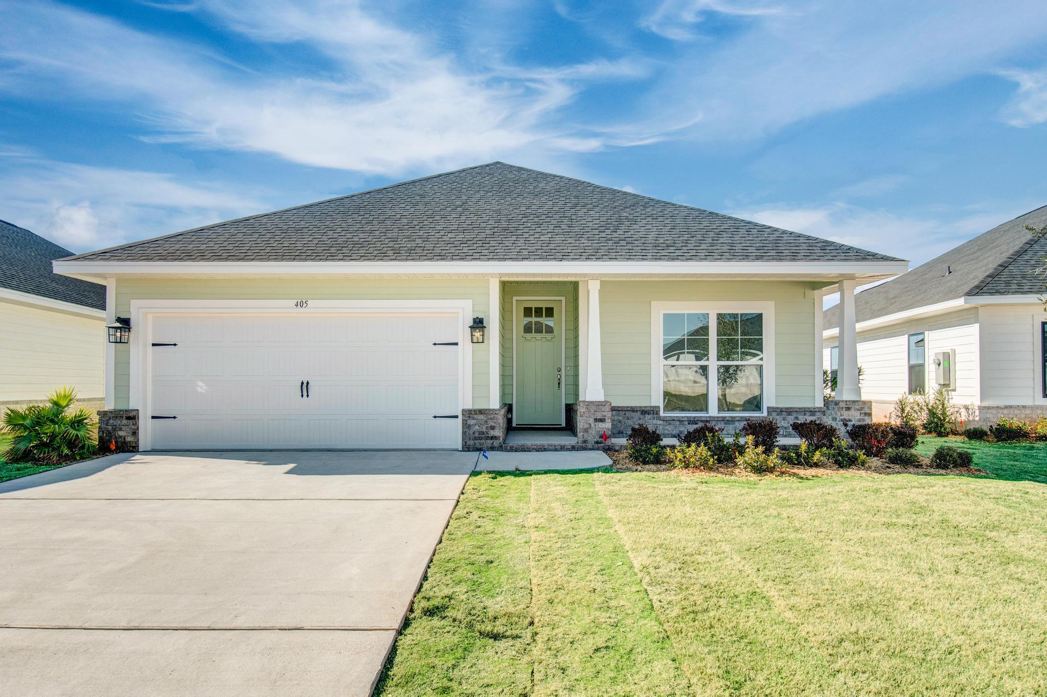 a front view of house with outdoor seating