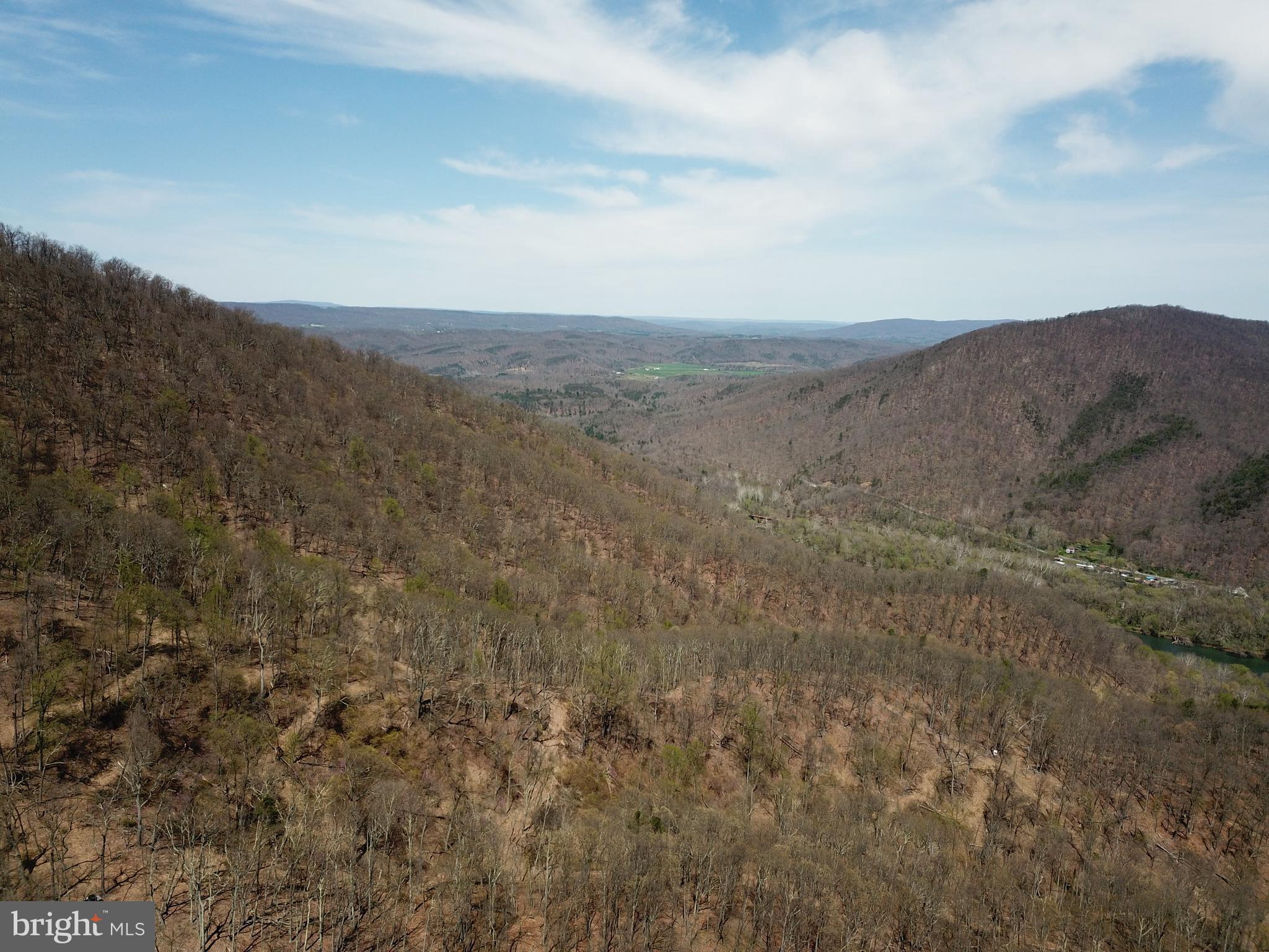 a view of mountain view with mountains in the background