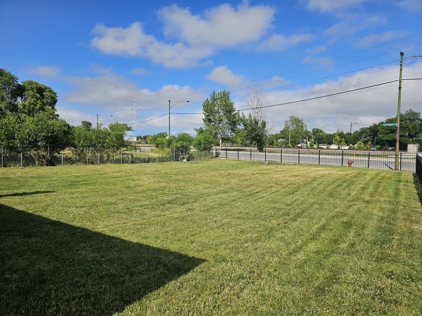 a view of a building with a big yard