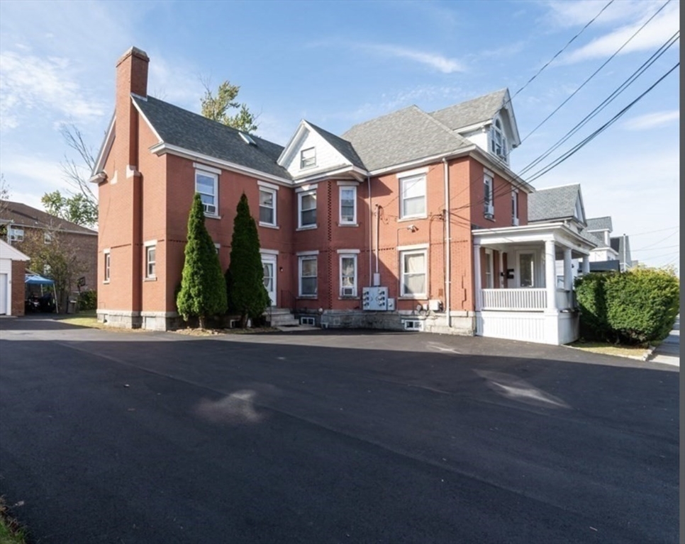 front view of a house with a street