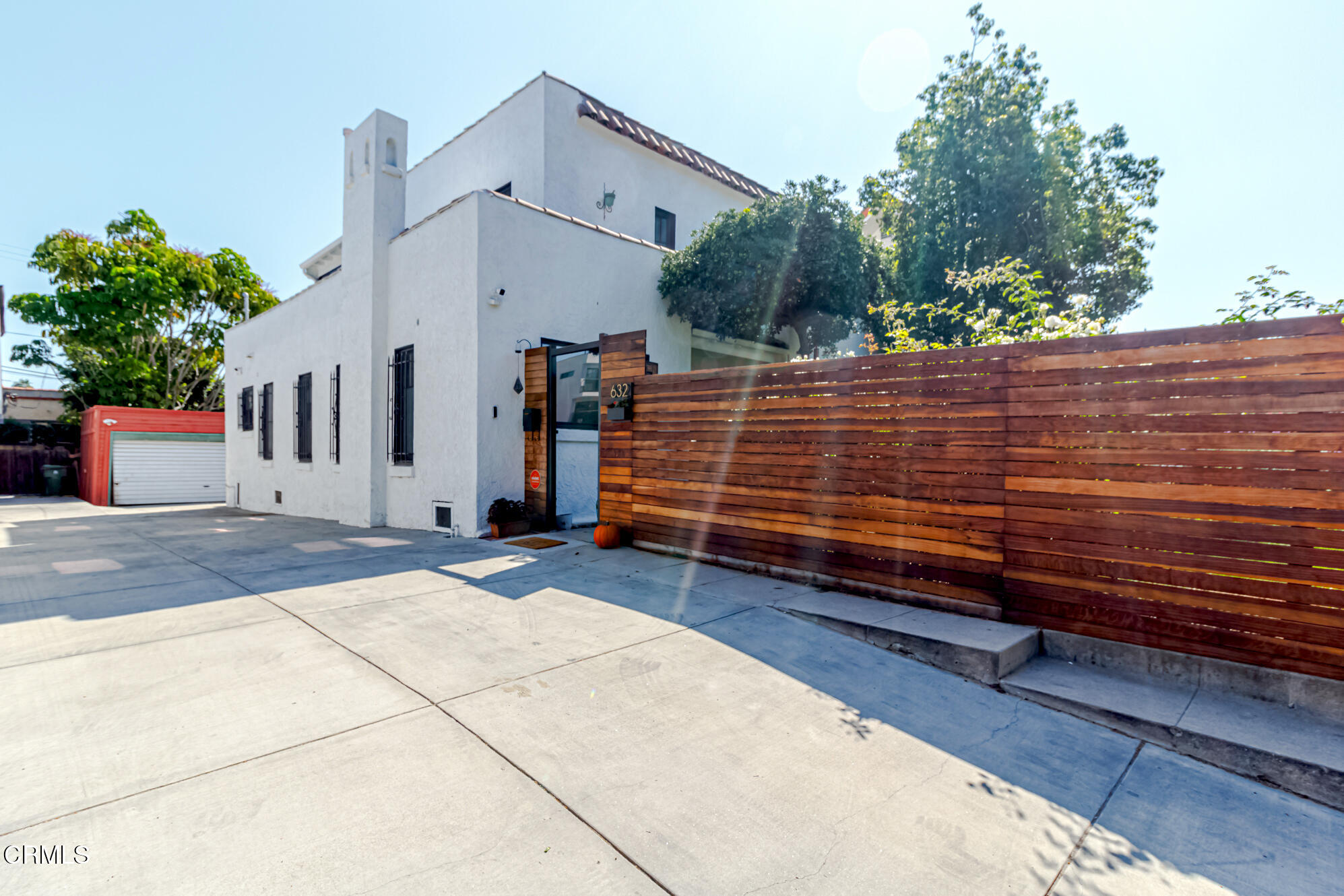 a view of a back yard of a house