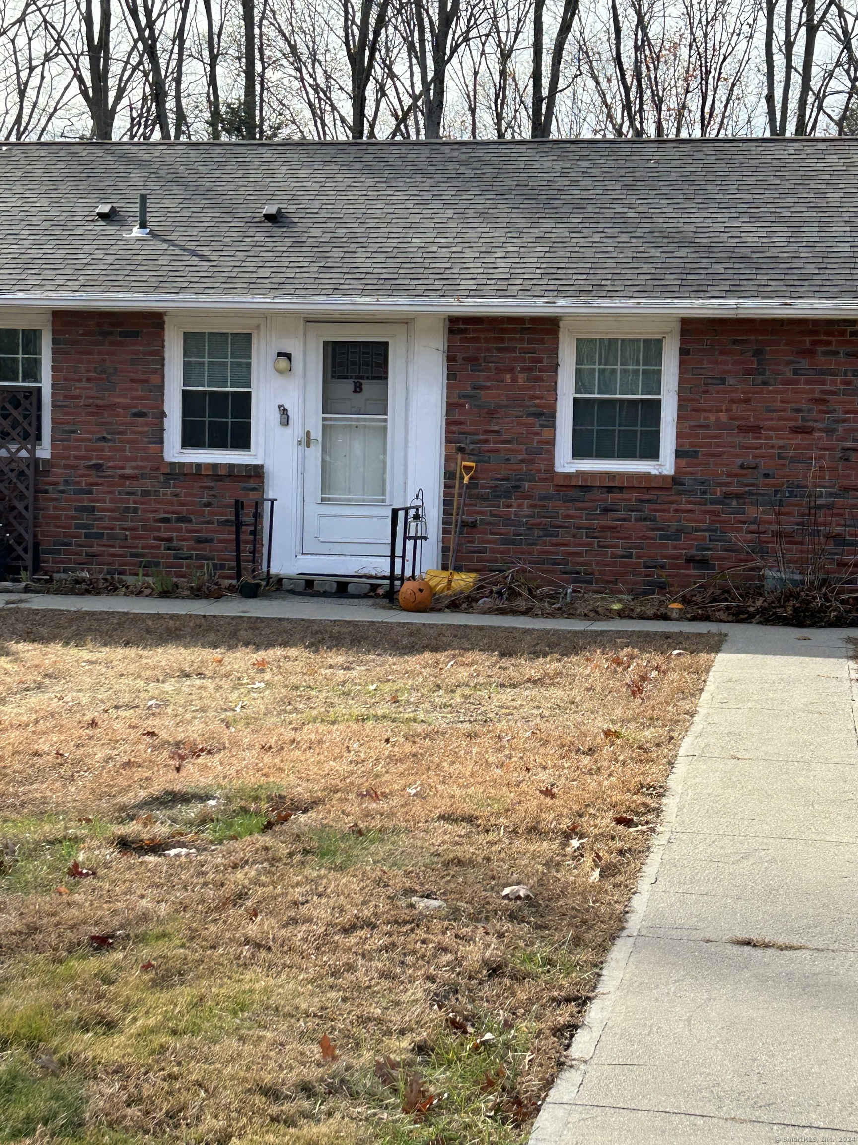 a front view of house with yard