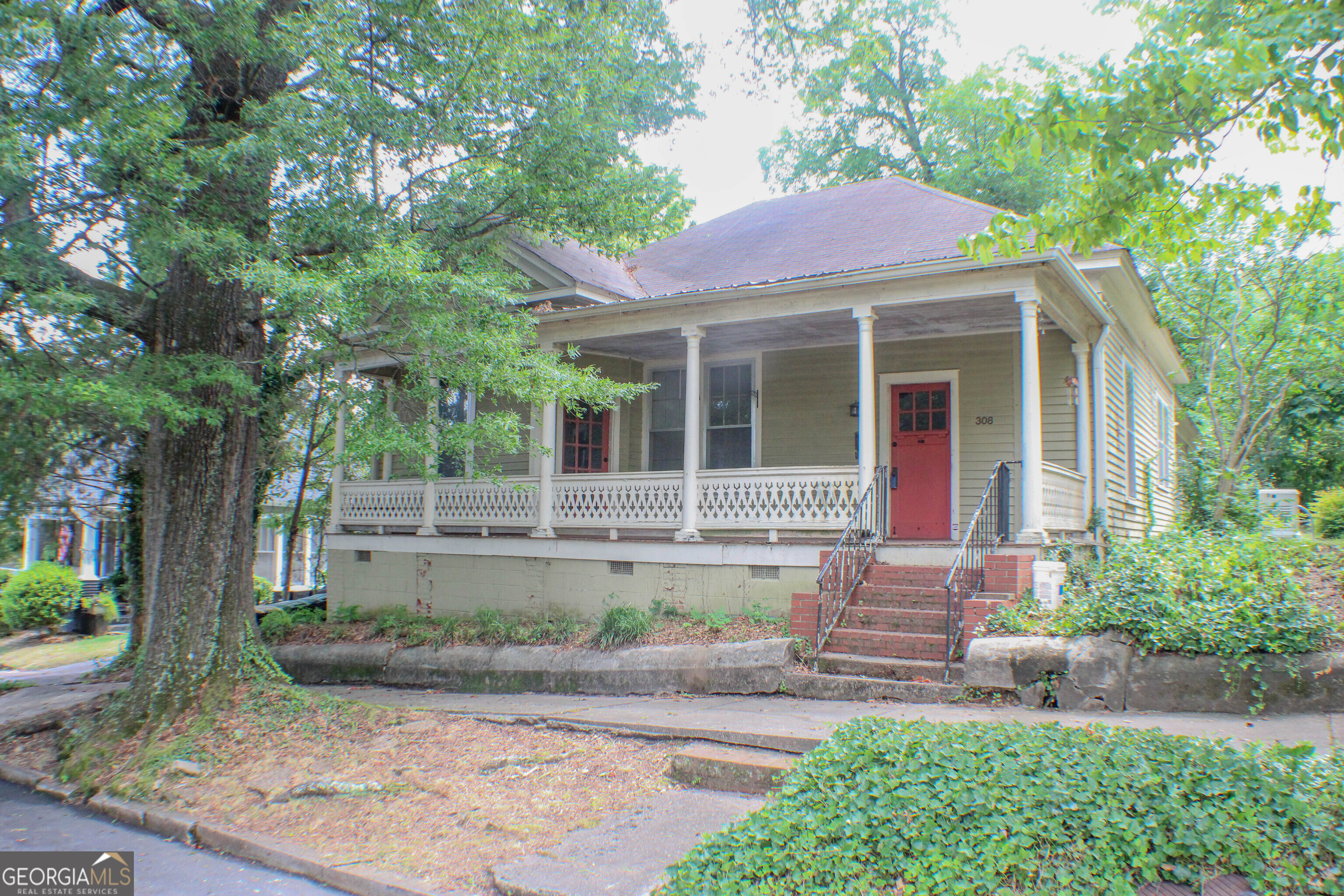 front view of a house with a yard