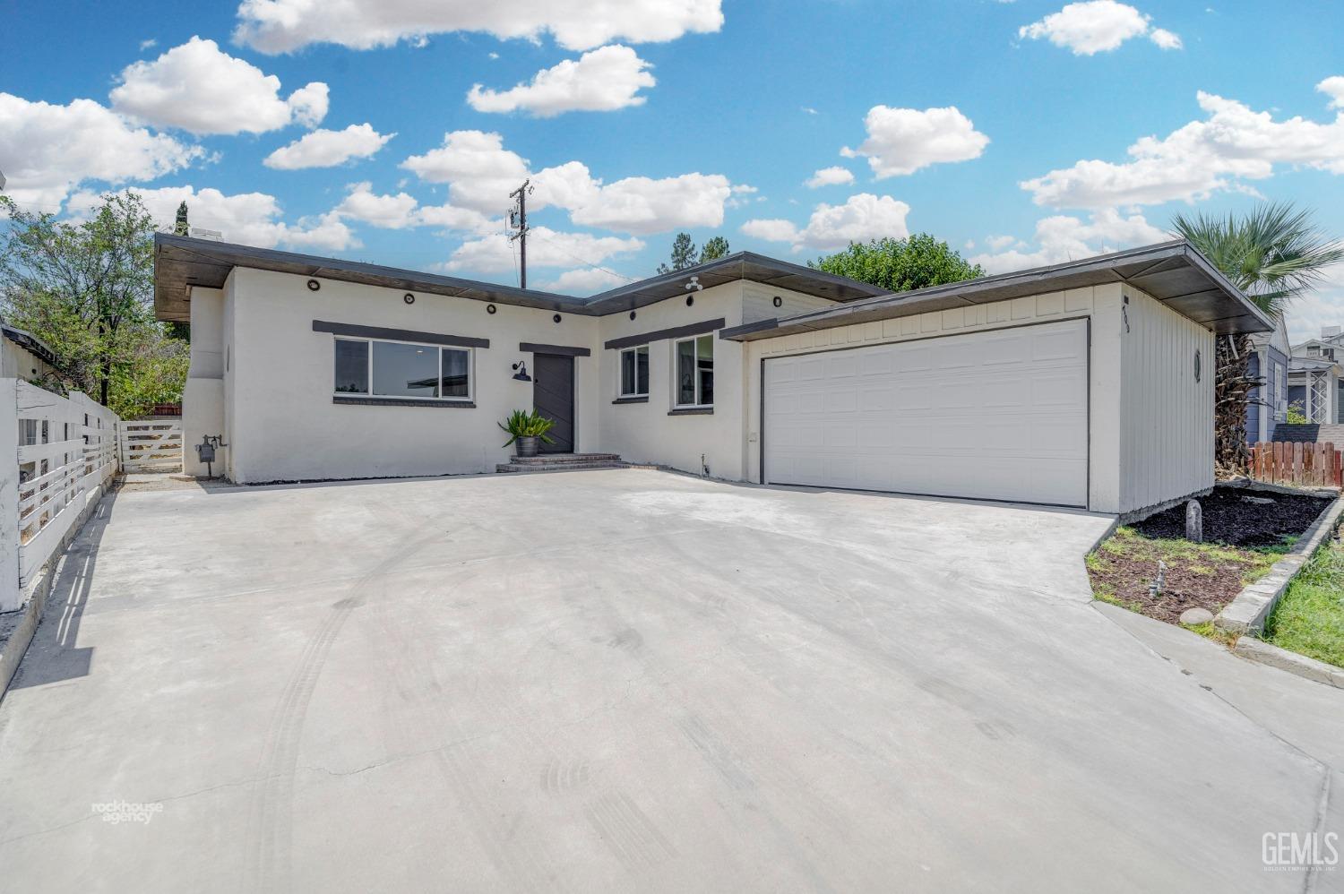 a view of a house with a garage