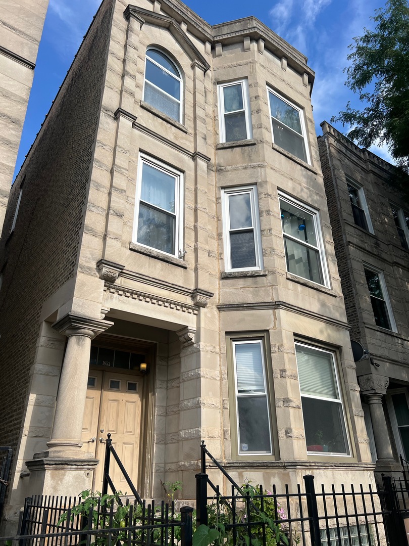 a building with a window and balcony