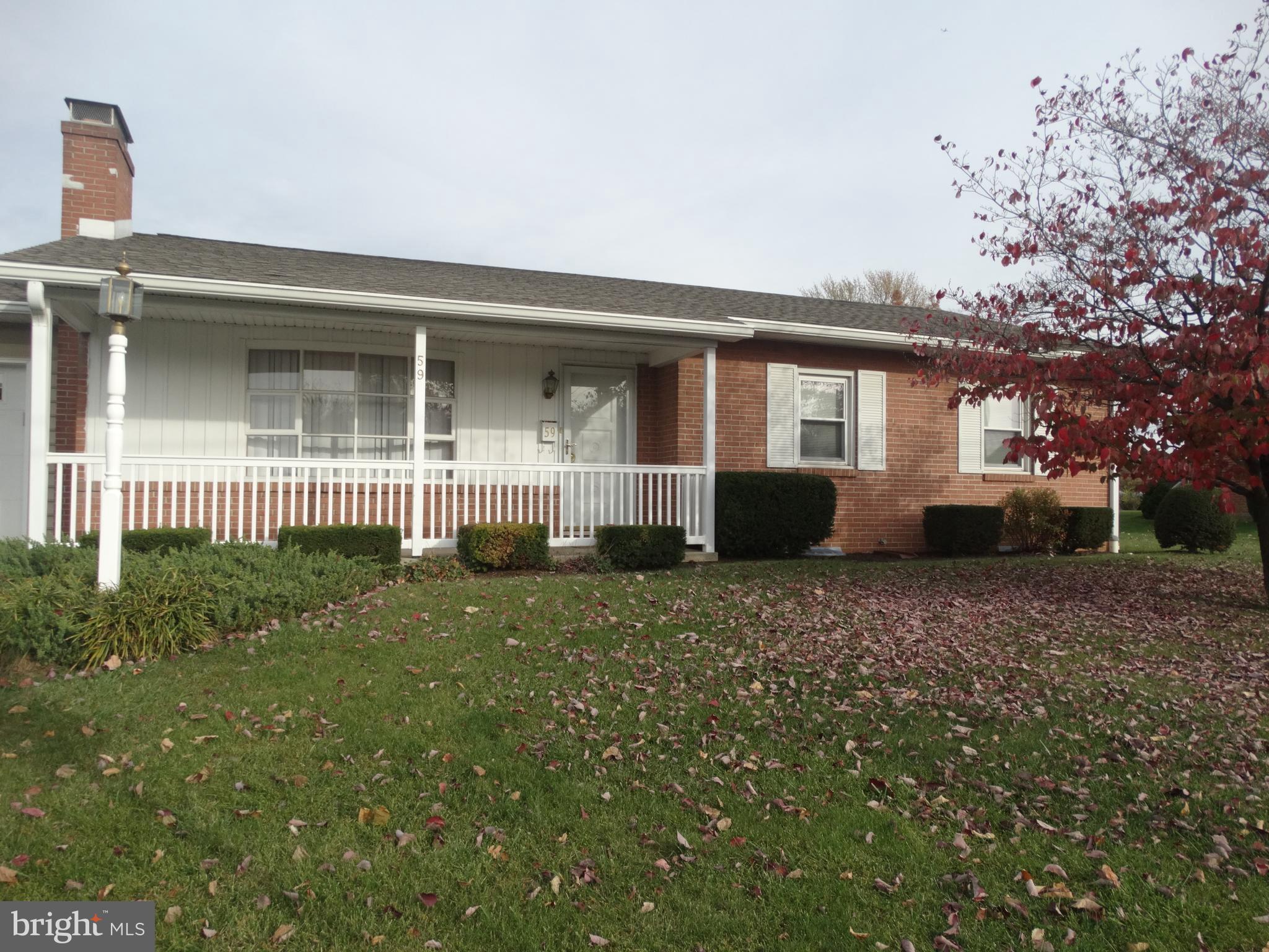 a view of a house with a garden