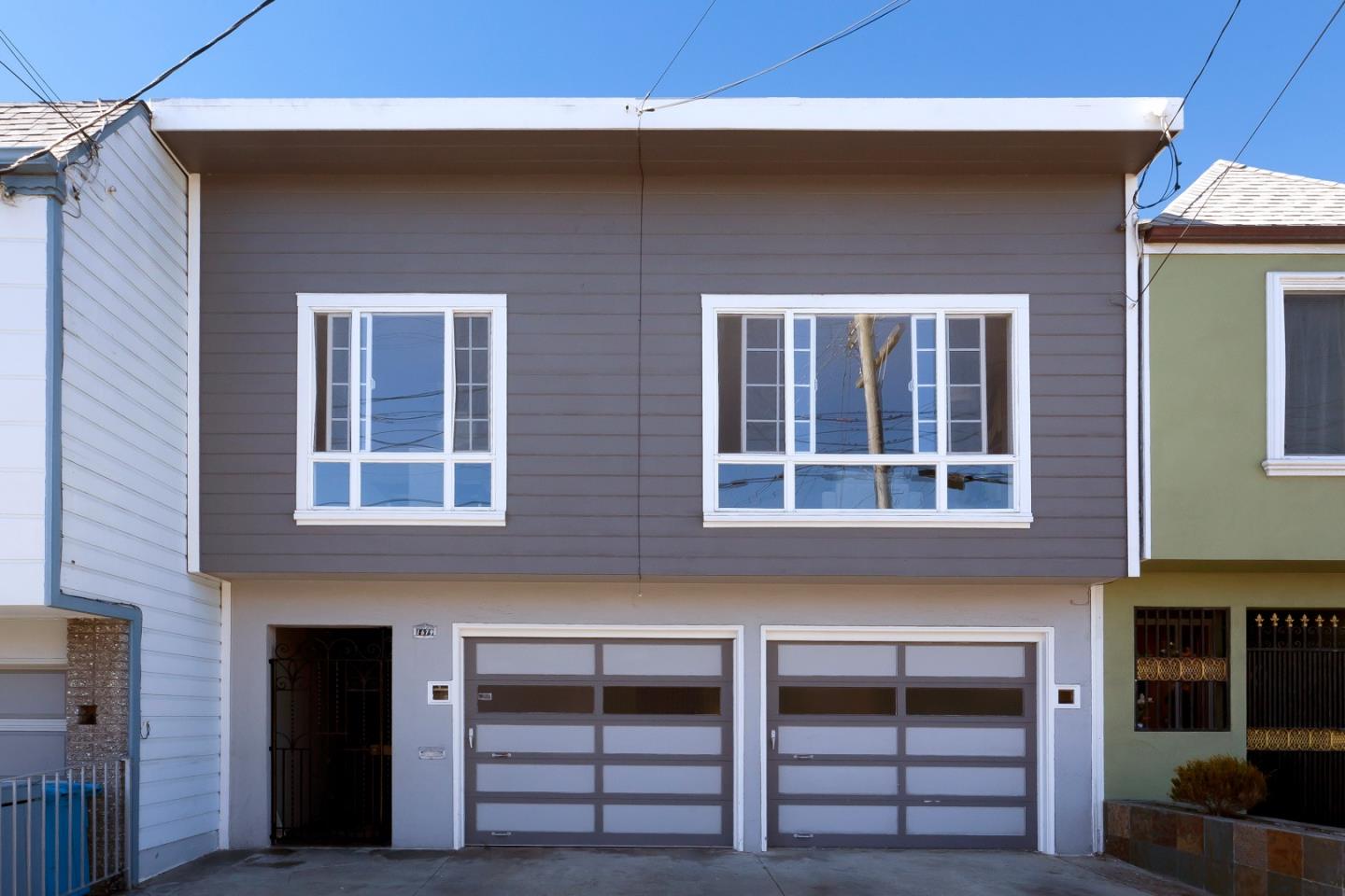 a front view of a house with a balcony